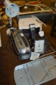 Table Lot Including; Desk Lamp, Heater, Telephone, Radio, Clock