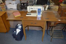 New Home Triple Zigzag Sewing Machine in Cabinet
