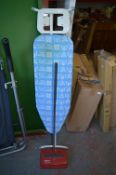 Ironing Board and a Ewbank Carpet Sweeper