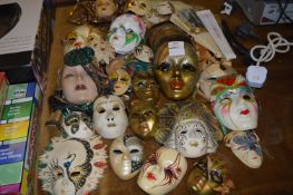 Collection of Decorative Face Masks and Fans
