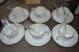 Twelve Piece Gilt Decorated Coffee Cups and Saucers with Spoons