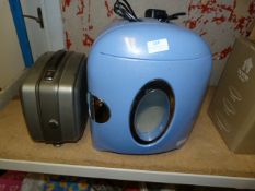 MIni Fridge and a Projector