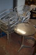 Two Circular Polished Aluminium Table with Eight Stackable Tubular Chairs