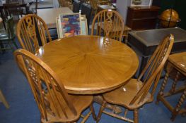 Circular Quartered Oak Pedestal Dining Table with Four Oak Wheelback Dining Chairs