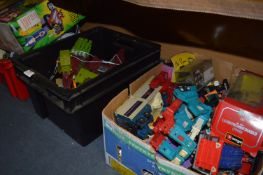 Three Boxes and a Bag of 1980s Hasbro Transformer Toys