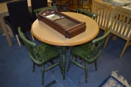 Circular Dining Table with Four Green Stick Back Chairs