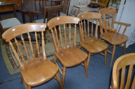 Three Stick Back Dining Chairs and a Carver