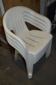 Set of Four White Plastic Garden Chairs