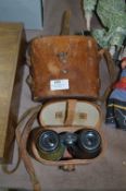Two Pairs of Leather Cased Binoculars
