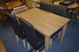Pine Dining Table and Four Leatherette Chairs