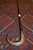 Horn Handled and Silver Banded Ebonised Walking Cane