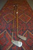 Two Wooden Shaft Golf Clubs