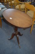 Oval Topped Occasional Table on Pedestal Base