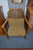 Beech Framed Cane Backed Armchair
