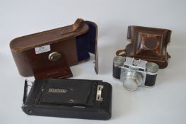Leather Cased Kodak Folding Camera and a Paxette Leather Cased Camera