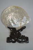 Pierced Carved Mother of Pearl Shell on a Carved Hardwood Sand