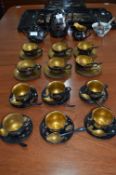 Chinese Black and Gilt Lacquered Forty Piece Paper Mache Tea Set