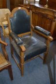 Oak Framed and Black Rexine Upholstered Armchair