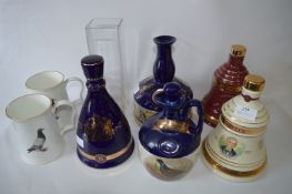 Wade Bell's and Others Whiskey Decanters and Two Pigeon Mugs