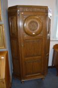Oak Wardrobe with Carved and Linen Fold Paneled Door and Sides