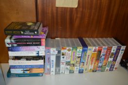 Collection of Paperback Books and VHS Children's Videos