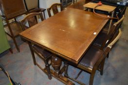 Oak Draw Leaf Table with Four Ercol Oak Dining Chairs