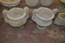 Pair of Urns on Stands