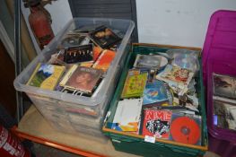 Three Boxes Containing a Large Collection of CDs