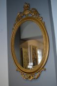 Gilt Framed Oval Wall Mirror