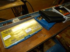 Assorted Drill Bits and a Spirit Level