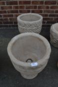 Pair of Patterned Garden Urns on Plinths