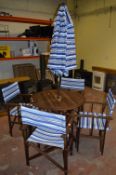 Circular Teak Patio Table with Four Directors Style Chairs and a Parasol