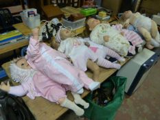 Collection of Twelve Real Life Dolls