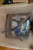 Box Containing Axes, Wire Brushes, Metal Shovels and a Engineers Vice