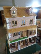 Large Four Tier Dolls House and Contents of a Large Amount of Dolls House Furniture