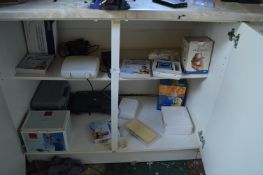 *Contents of Cupboard Which Includes; Drug Free Pain Relief Tens Machines, Nebulizers, etc.