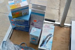 *Assorted Personal Aids Including Drinking Cups, Can Crusher, Napkleen, Stocking Aids, etc.