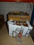 Two Boxes Containing Krusovice Branded Pint Glasses with Handles