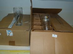 Two Boxes of Tetleys and Carlsberg Branded Pint Glasses