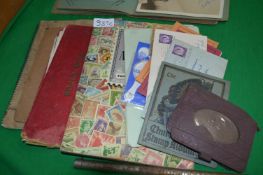 Collection of Stamps in an Album and Loose