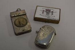 Silver Vesta and Two Other Vesta Cases