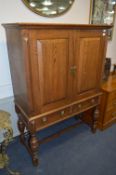 Large Oak Two Door Cabinet with Lion Head Handles