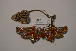 Coloured Stone Set Butterfly Brooch and a Stone Set Pilgrim Necklace and Pendant