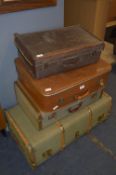 Three Suitcases and a Travel Trunk
