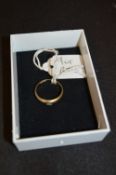 9cT Gold Ring Set with Single Clear Cut Stone
