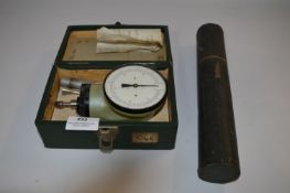 Tachometer and a Glass Thermometer