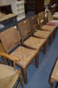 Set of Four Oak Dining Chairs with Dropping Seats