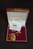 9cT Gold Necklace with Heart Shaped Locket