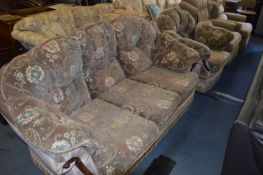 Floral Upholstered Suite; Three Seater and an Armchair