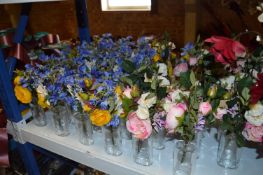 *Thirty Floral Displays in Clear Glass Vases